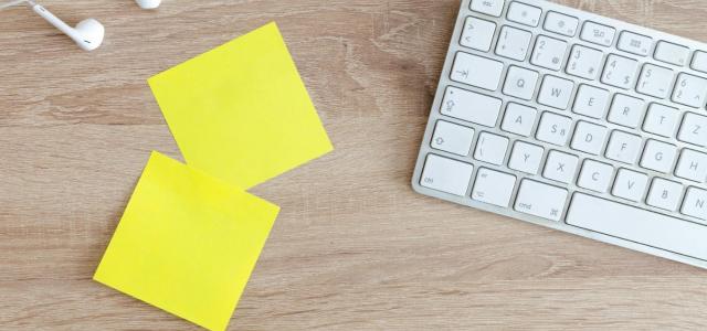 Sticky notes beside keyboard